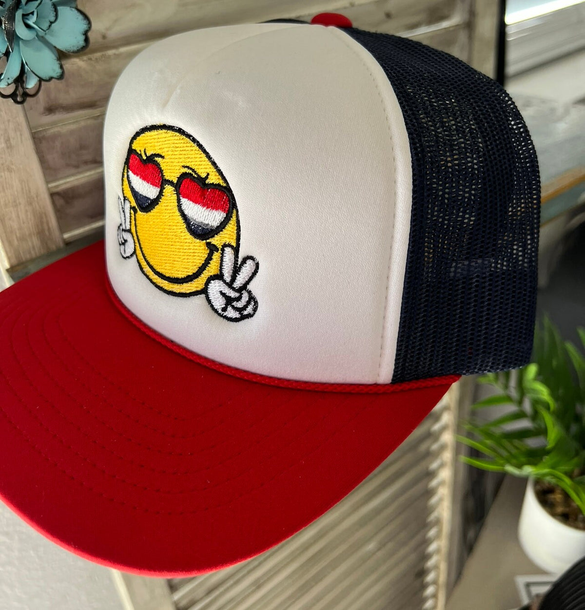 Peace Out Smiley Embroidered Trucker Hat