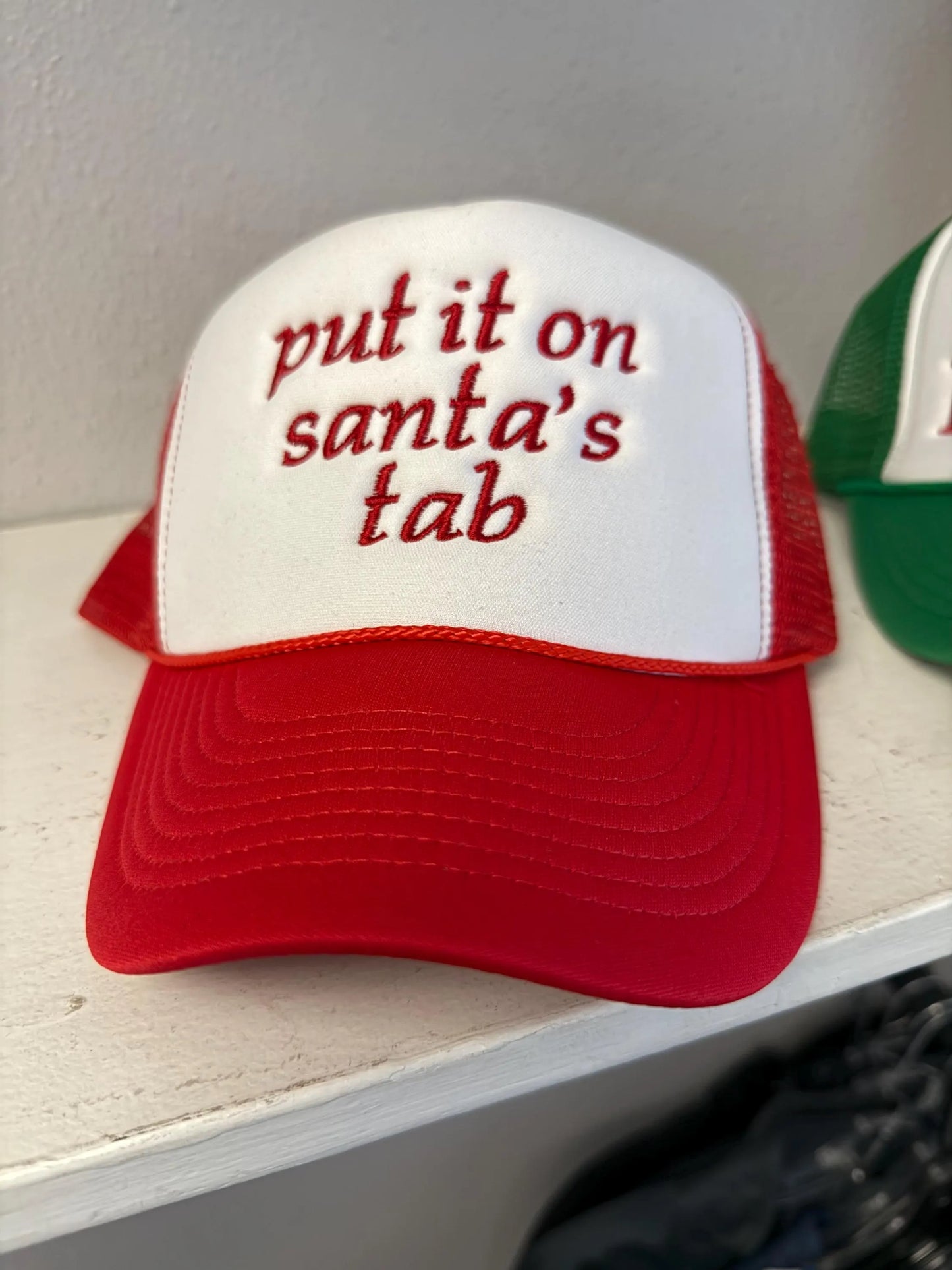 Put it on Santa's Tab Trucker Hat